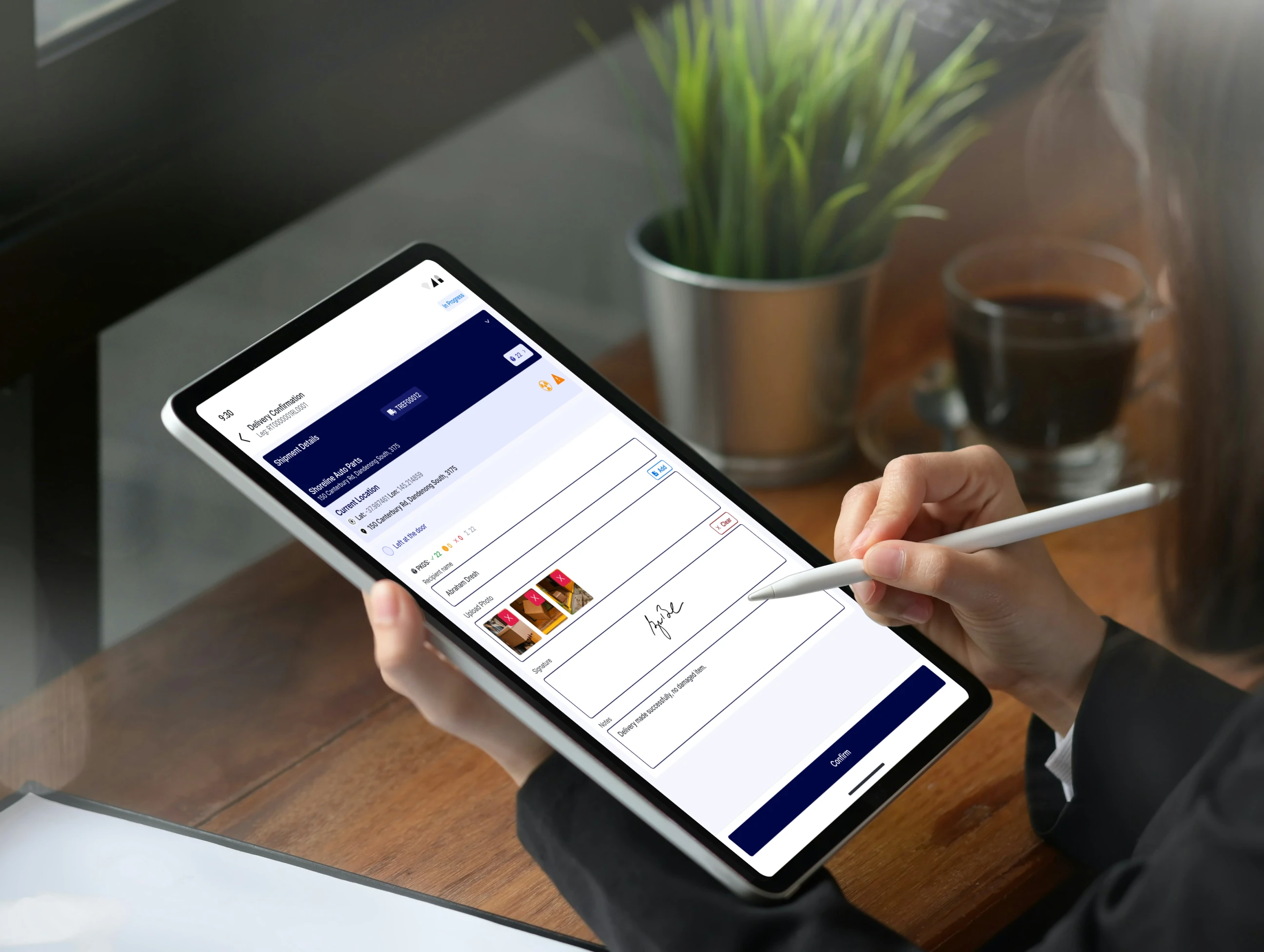 Customer signing on a tablet to confirm delivery using the RouteCTRL ePOD interface.